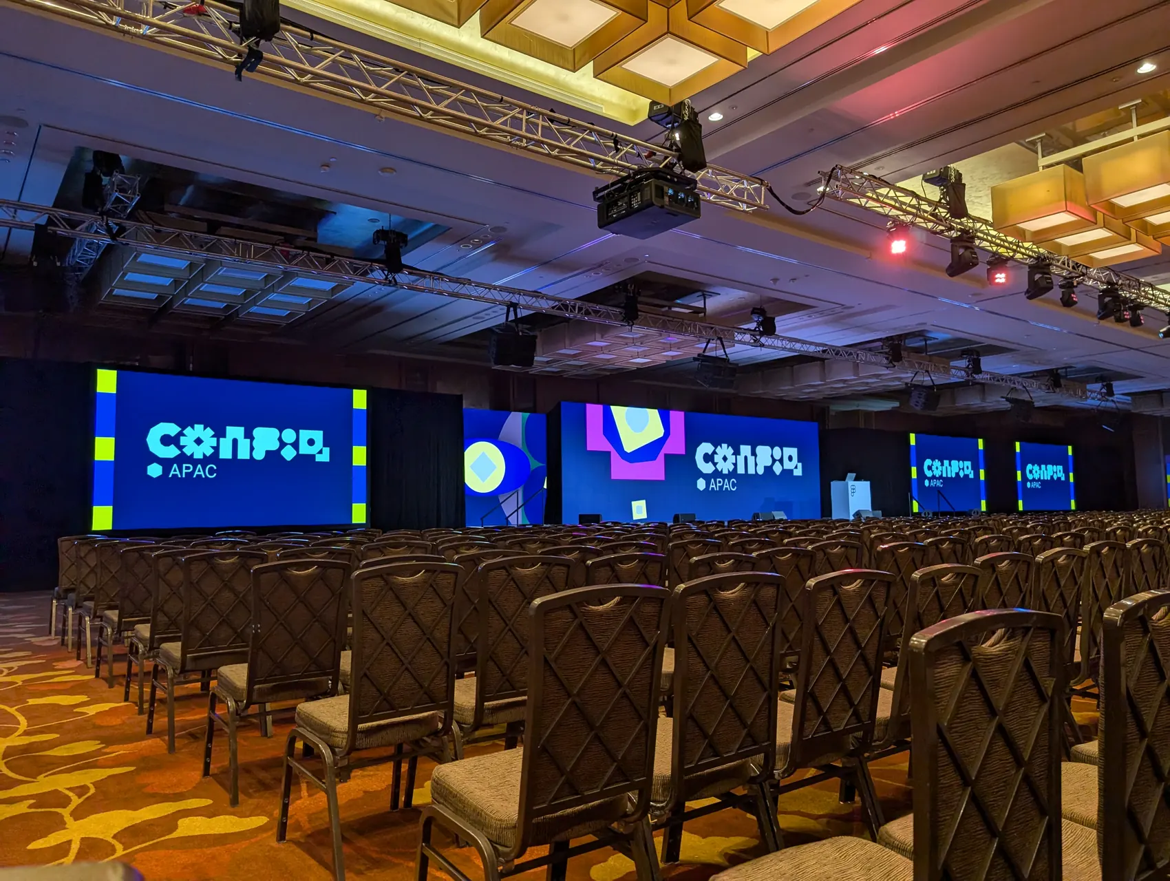 Summit stage with LED screens and audience seating